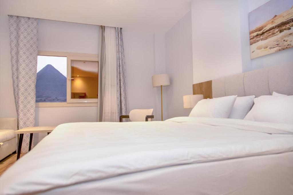 Al Farida Boutique Pyramids Hotel Kafrat al Jabal Luaran gambar